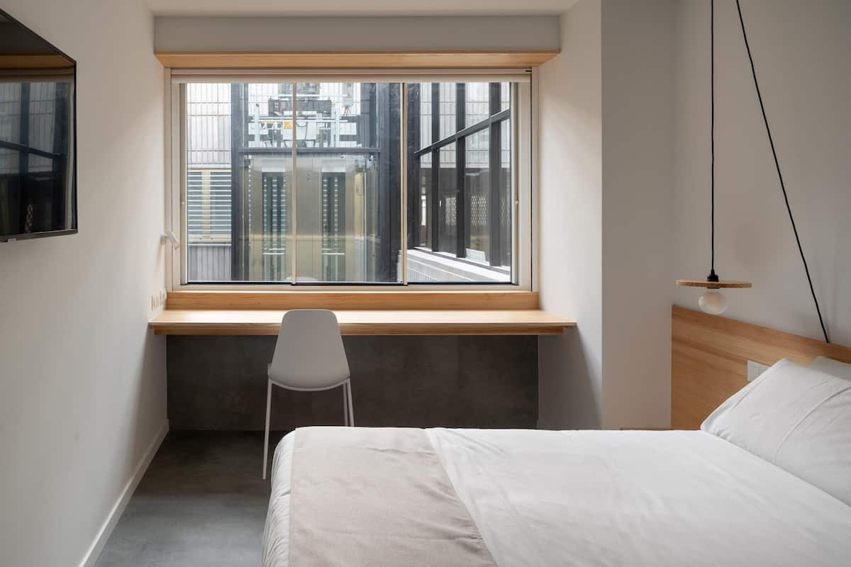 Economy tweepersoonskamer, uitzicht op binnenplaats | Luxe beddengoed, donzen dekbedden, bedden met traagschuimmatras