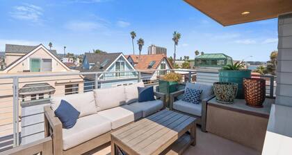 Modern beach home only 8 houses from the beach. Check out our new drone video!!