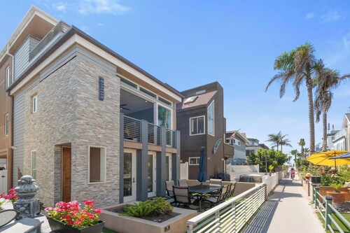Modern beach home only 8 houses from the beach. Check out our new drone video!!