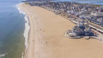 On the beach, sun loungers, beach towels