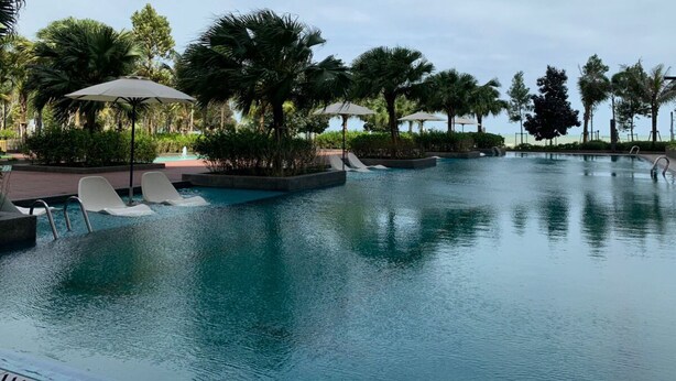 5 outdoor pools, open 7:00 AM to 8:00 PM, pool umbrellas, sun loungers - Deluxe Studio at Timurbay with Seaview (Kuantan)