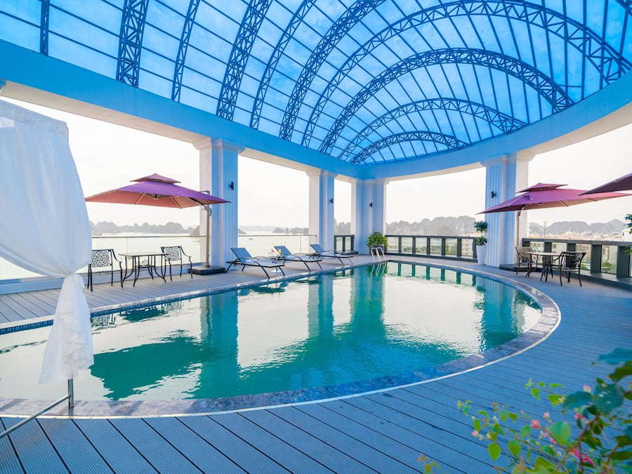 Outdoor pool, pool umbrellas, pool loungers