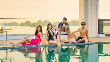 Outdoor pool, pool umbrellas, pool loungers