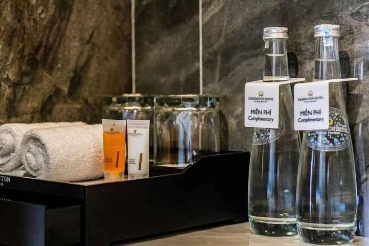 Bathroom amenities | Rainfall showerhead, eco-friendly toiletries, hair dryer, bathrobes