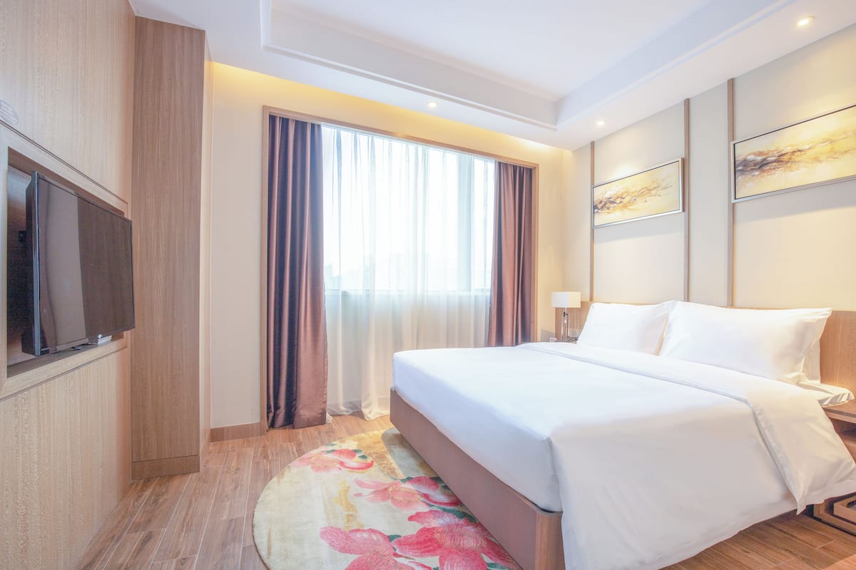 Phòng dành cho gia đình | 1 phòng ngủ, minibar với thức uống miễn phí, két bảo mật tại phòng