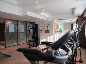 Stay active in our well-equipped gym with a stationary bike, weight machines, and a treadmill.