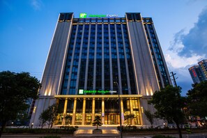 A tall hotel building with a prominent Holiday Inn Express sign at the top. - Holiday Inn Express Changzhou Xinbei (Changzhou)