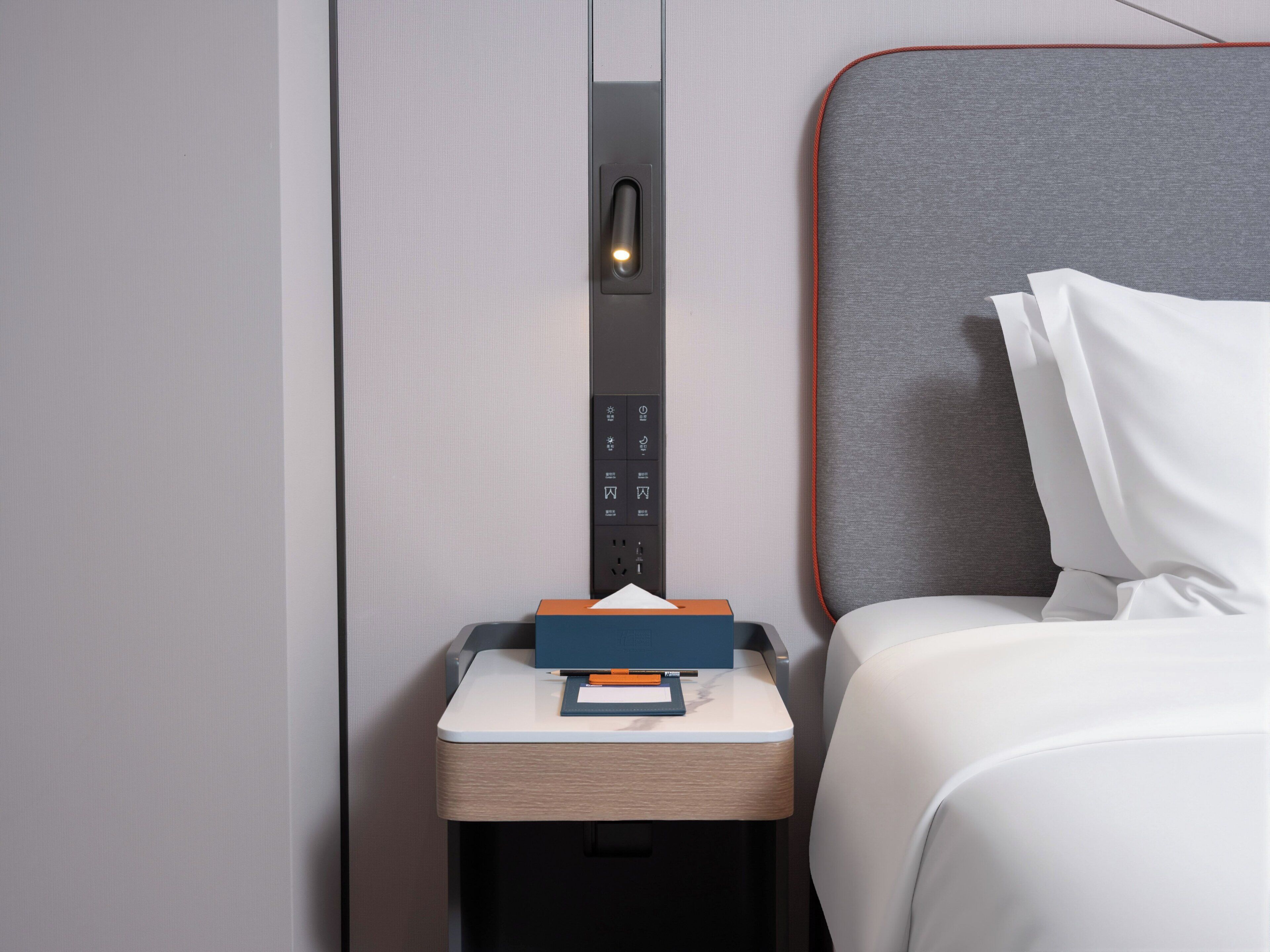 Premium bedding, down comforters, desk, laptop workspace