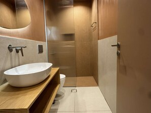 Bathtub, hair dryer, towels