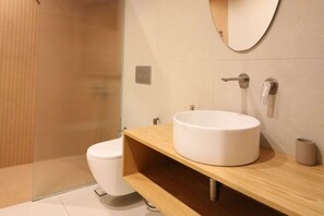 Bathtub, hair dryer, towels