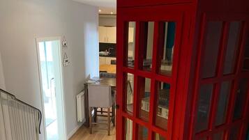 Apartamento conforto | Área de estar | TV de tela plana