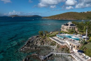 Enjoy stunning sea views from the rooftop pool and relax in the beautifully maintained garden.