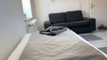 Apartamento conforto | Área de estar | TV