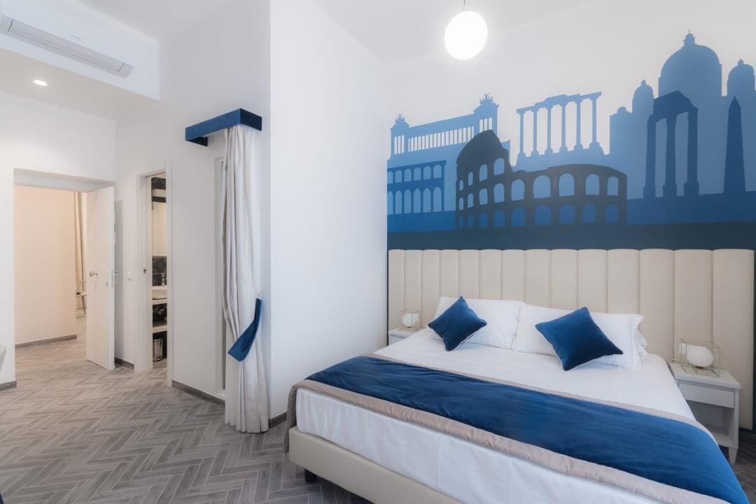 Superior Quadruple Room | Minibar, in-room safe, individually decorated, individually furnished