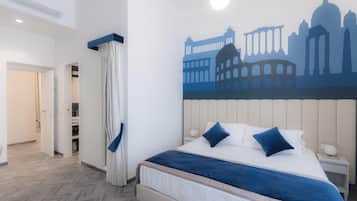 Quarto quádruplo superior | Frigobar, cofres nos quartos, individualmente decorados