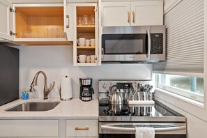 Fridge, microwave, oven, stovetop - 1920s Carriage House near Vanderbilt | Walkable, Dog-Friendly, Sleeps 5 (Nashville)