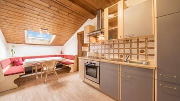 Fridge, stovetop, coffee/tea maker, electric kettle