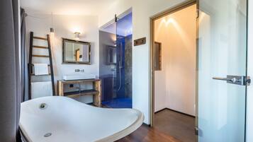 Douche, articles de toilette gratuits, serviettes fournies