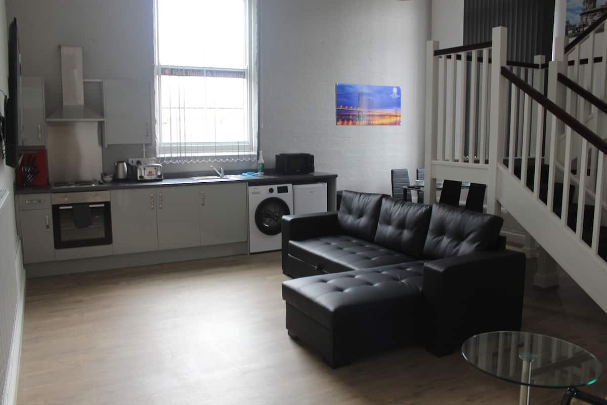 Appartamento Deluxe | Area soggiorno