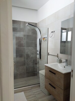 Hair dryer, towels, soap, shampoo