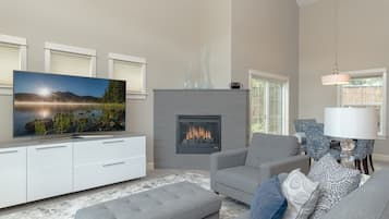 Smart TV, fireplace, books, offices
