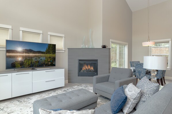 Smart TV, fireplace, books, offices