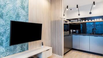 Panoramic Apartment | Private kitchen | Fridge, oven, stovetop, dishwasher