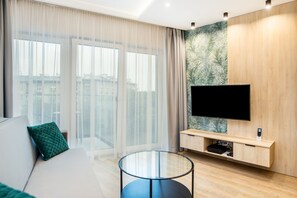 Panoramic Apartment | Living area | 40-inch LCD TV with cable channels, TV - Serviced Apartments G11 - between Main Market Square and Jewish Quarter by InPoint (Kraków)
