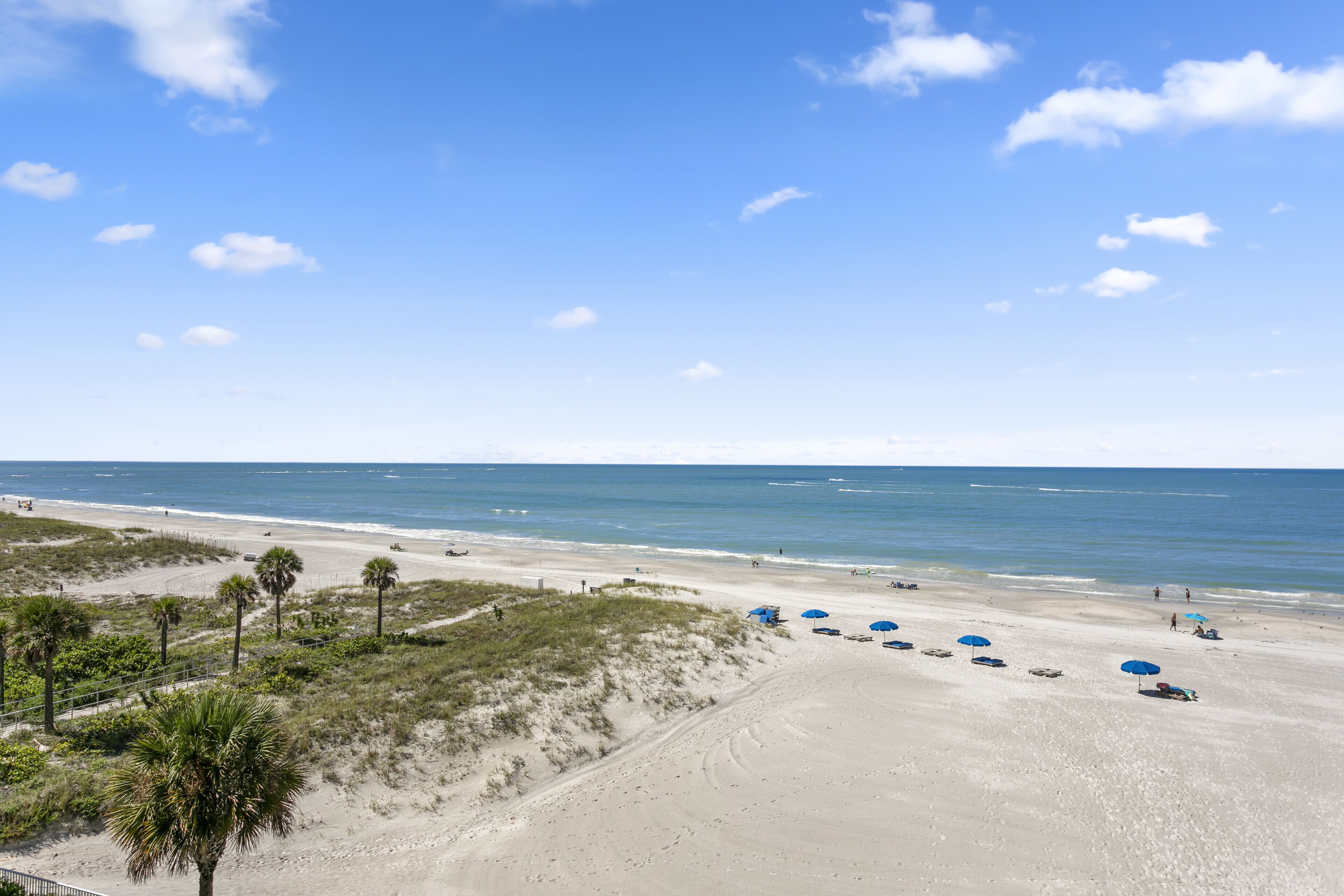 On the beach, sun loungers, beach towels