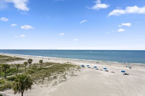 On the beach, sun-loungers, beach towels
