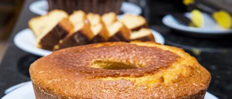 A cake on a plate with a cake in the background.