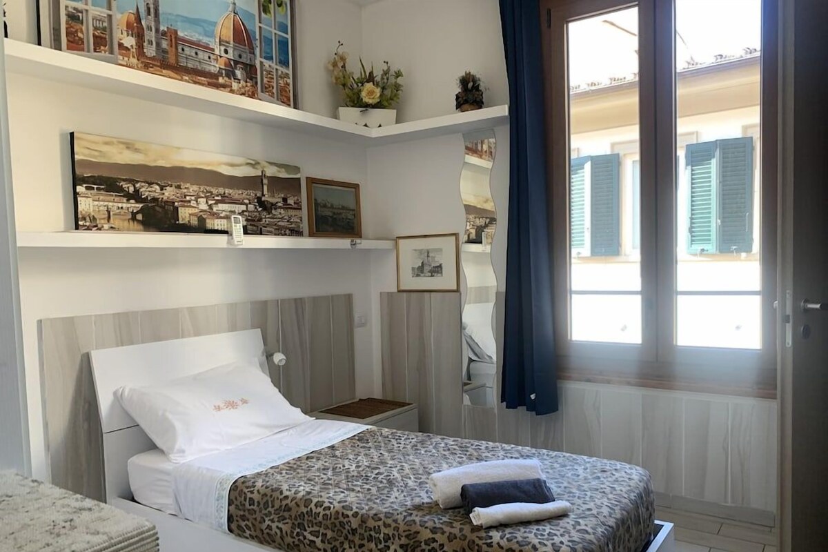 Premium bedding, down comforters, laptop workspace, WiFi (free)