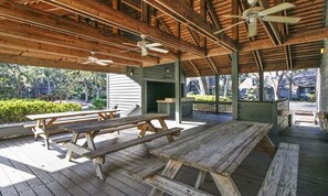 Enjoy dining or socializing on the shaded deck with a view of the surrounding neighborhood.