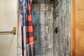 Combined shower/tub, hair dryer, towels, soap