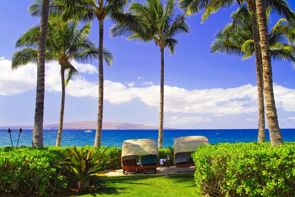 On the beach, sun-loungers, beach towels