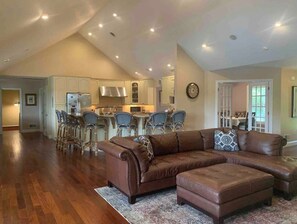 Smart TV, fireplace, table football, books