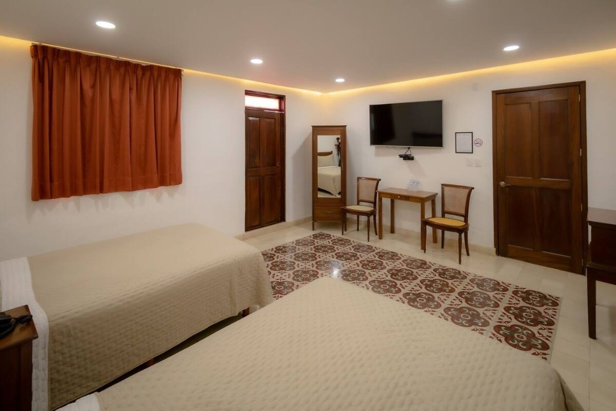 comfort room, 2 double beds, balcony | free wifi, bed sheets