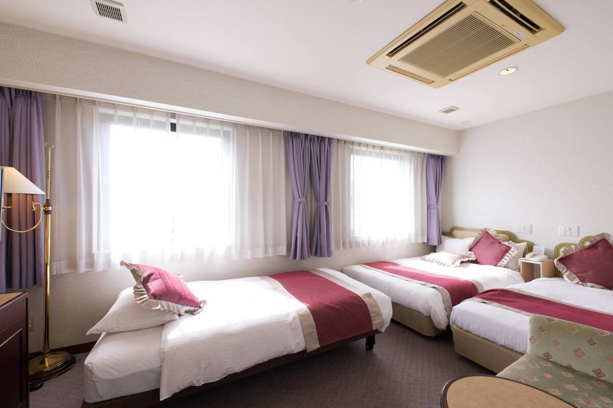 Desk, laptop workspace, free WiFi, bed sheets