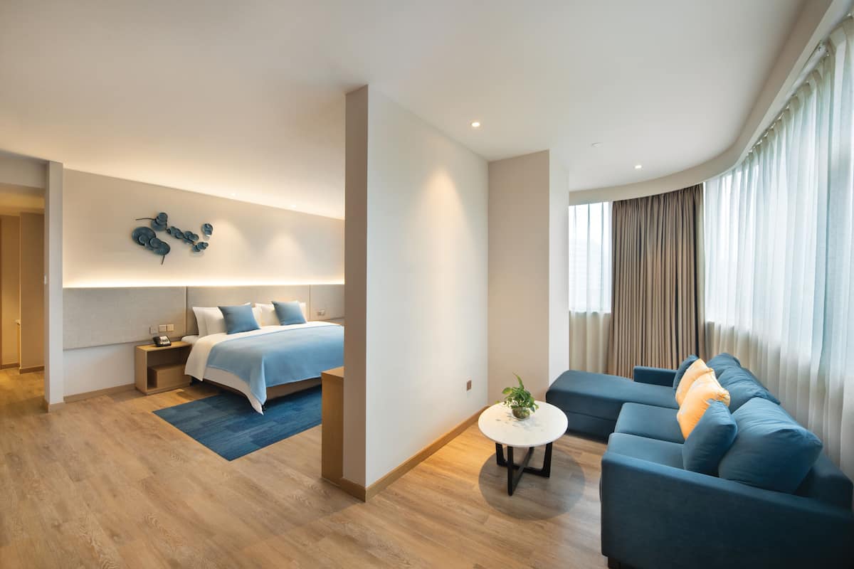 Quarto executivo, 1 cama King | 1 quarto, cofres nos quartos, cortinas blackout