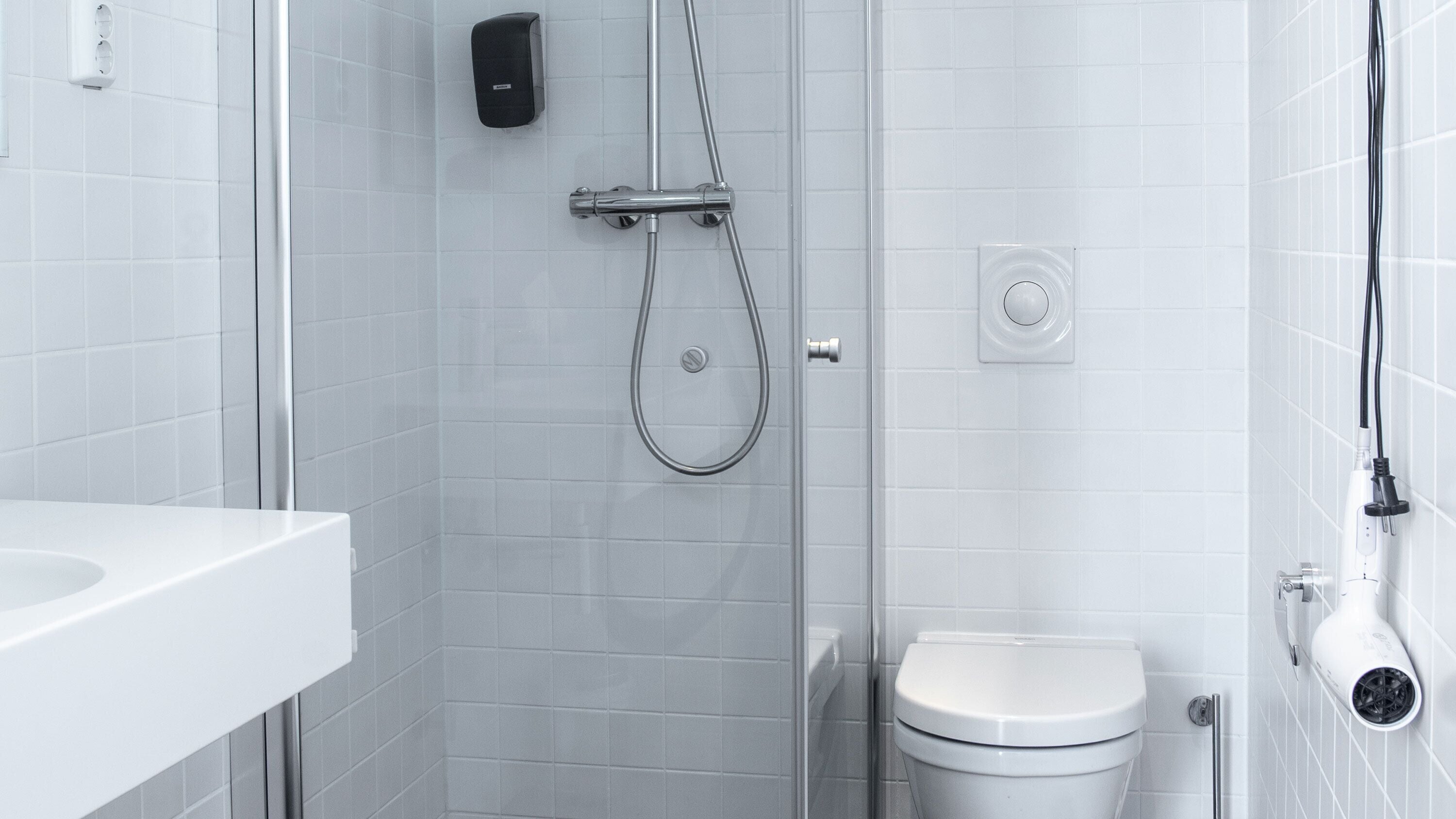 standard apartment | bathroom | shower, hair dryer, heated floors, towels