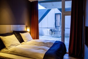 Apartamento estándar | Edredones de plumas, cortinas opacas, sistema de insonorización