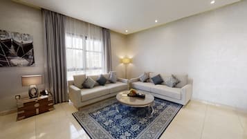 One Bedroom City View Apartment | Living area