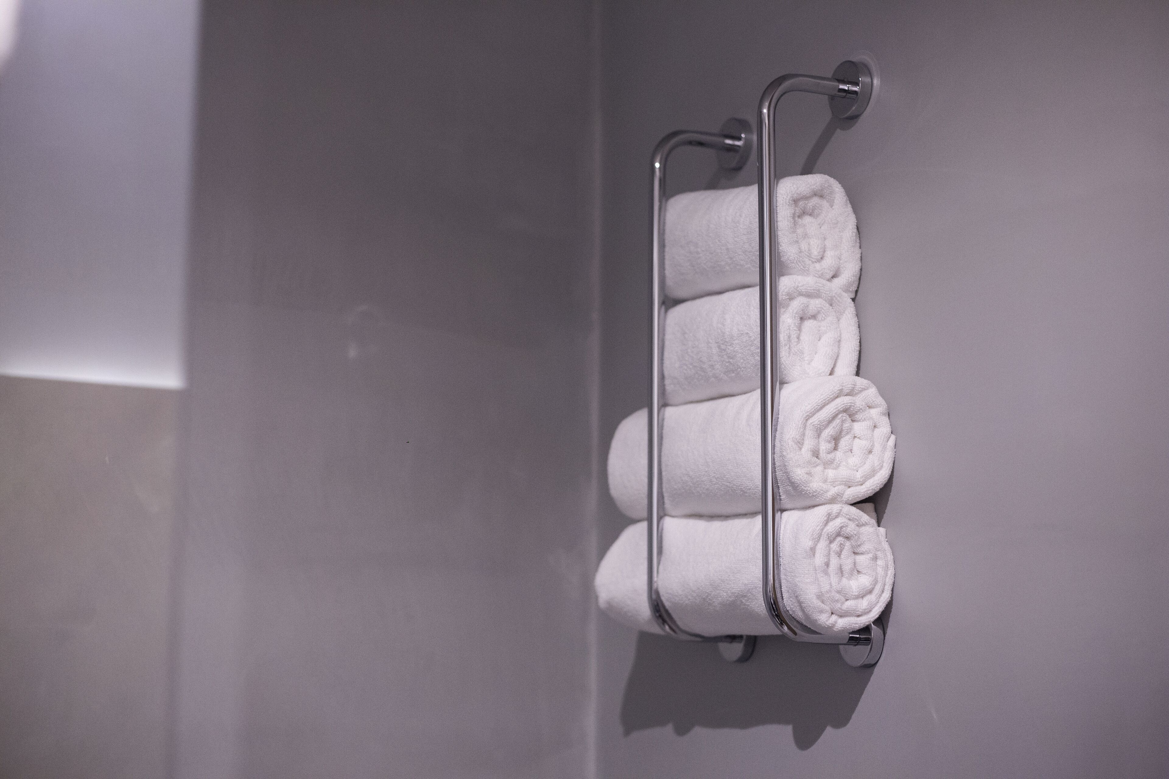 standard room | bathroom | designer toiletries, hair dryer, slippers, towels