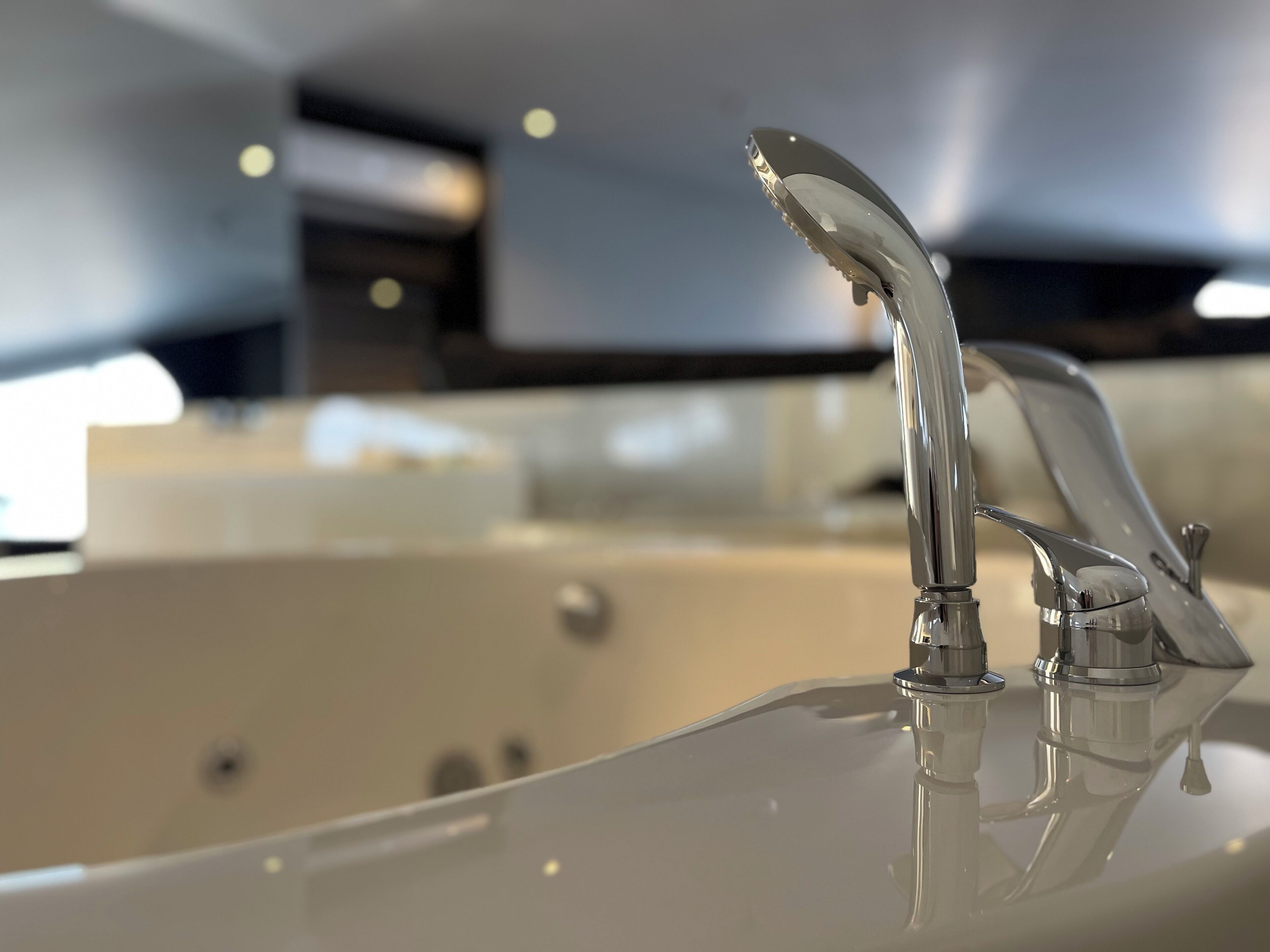 king suite | bathroom | designer toiletries, hair dryer, slippers, towels