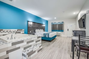 Suite, 1 King Bed, Smoking, Jetted Tub | Desk, laptop workspace, iron/ironing board, bed sheets - Americas Best Value Inn & Suites Houston at Hwy 6 (Houston)