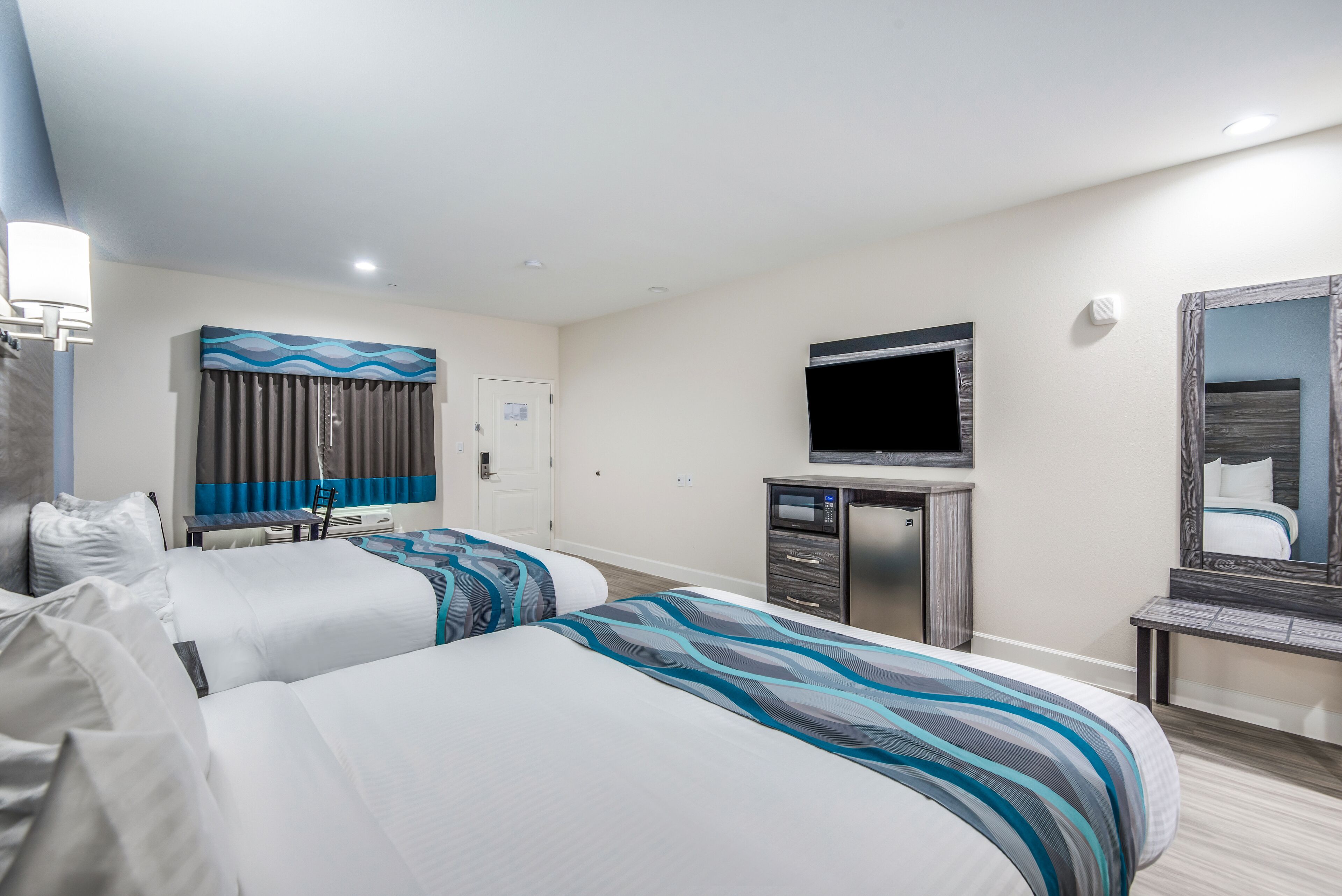 room, 2 queen beds, smoking | desk, laptop workspace, iron/ironing board, bed sheets