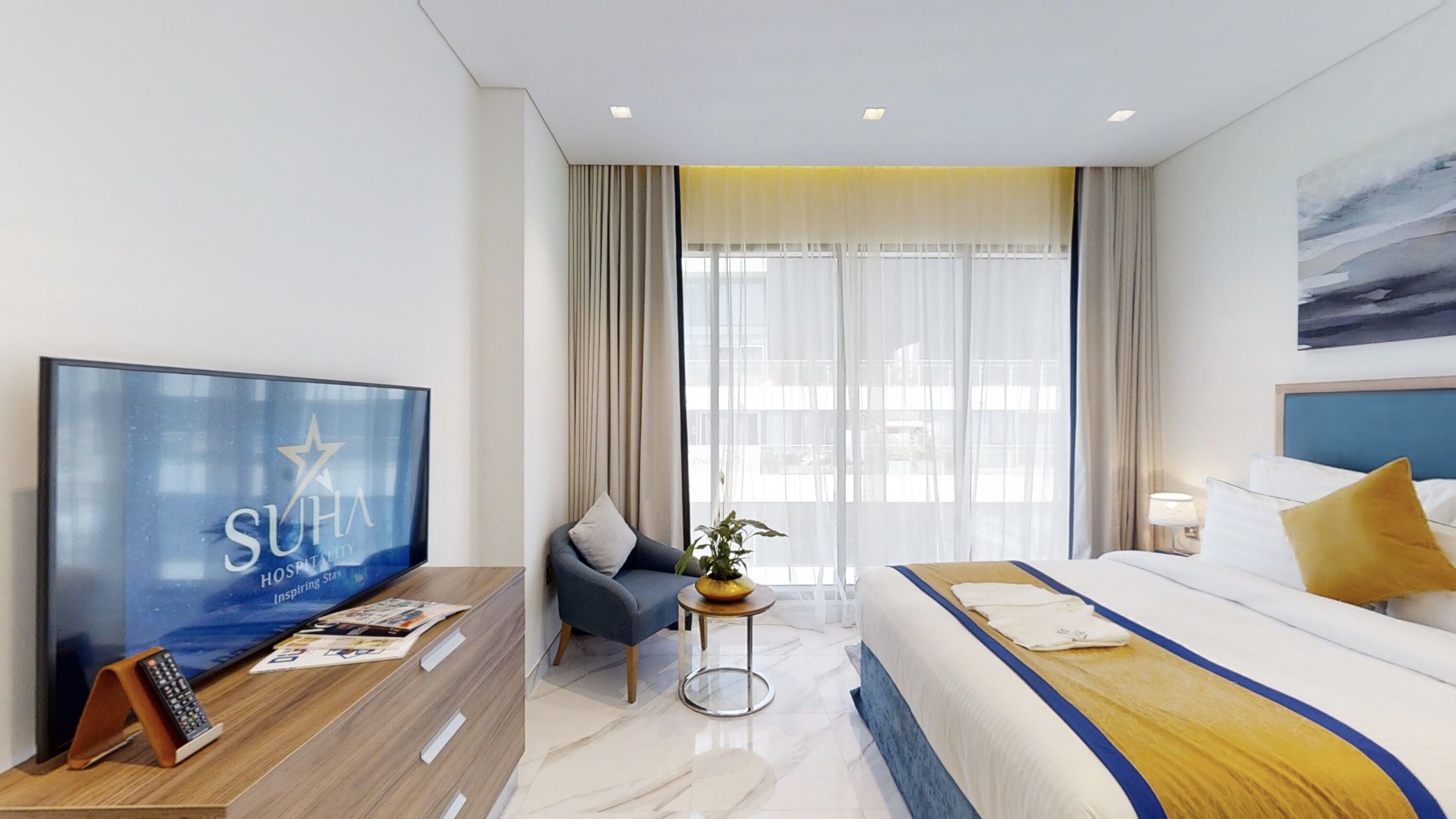 Premium bedding, down comforters, in-room safe, desk
