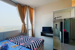 Studio | Desk, soundproofing, free WiFi, bed sheets - Sultan Premiere Sagara (Depok)