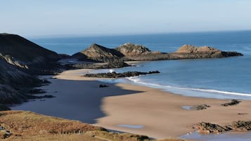 Plage, chaises longues