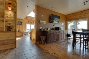 Smart TV, fireplace, table football, stereo